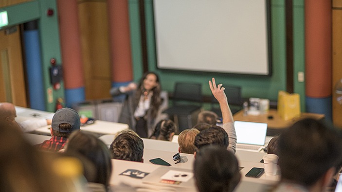 Audience engaged in discussion during a City Speaker Series lecture at Cambridge Judge Business School.